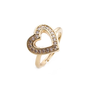 Detailed macro view of gold-plated heart ring featuring pavé set sparkling zircon stones