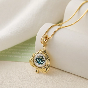 Golden Evil Eye spade leaf pendant necklace with elegant box chain for women