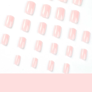 Glossy light pink medium square press-on nails in various sizes on a clean white background