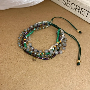 Bohemian multi-layer seed bead bracelet with crystal accents and adjustable pull cord