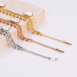 Three-piece stainless steel heart charm bracelets set in gold, rose gold and silver finish