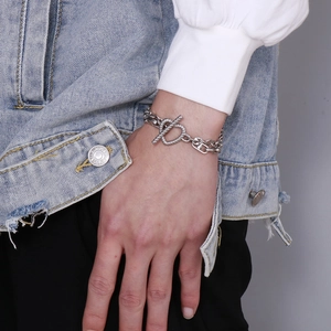 Detailed close-up of a silver titanium steel bracelet with OT toggle clasp and chunky chain
