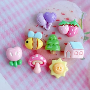 Colorful mini resin charms including bees and mushrooms for DIY cream glue crafts