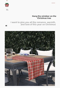 Outdoor close-up of a festive red and white plaid table runner on a metal table surface