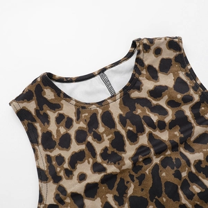Detail of the crew neckline and fine stitching on the leopard print tank dress