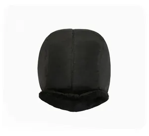 Overlook of black winter trapper hat featuring windproof fabric and thick faux fur lining
