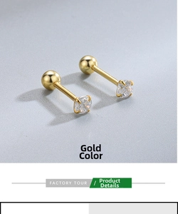 Macro detail of golden S925 silver stud earrings with screw back and sparkling zircon