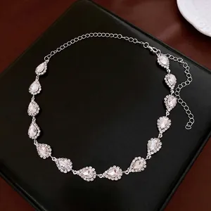 Luxury silver-toned waterdrop zircon necklace set on black leather display case