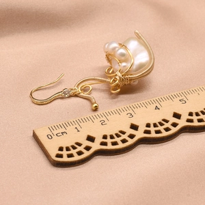 Elegant handmade baroque pearl earrings with gold wire wrap design and 5cm length