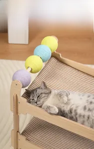Solid wood double-layer cat hammock featuring colorful sisal scratching balls and striped canvas