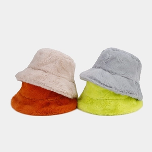 Plush faux fur bucket hats in beige orange gray and yellow for winter warmth