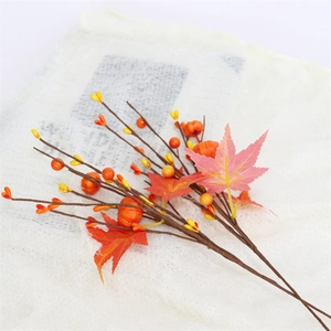 Artificial pumpkin and maple leaf picks for Halloween and Thanksgiving home decor