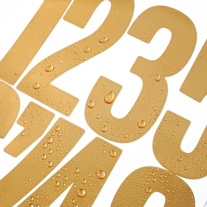 Detailed view of 5-inch gold foil numeric stickers featuring a waterproof surface with water drops