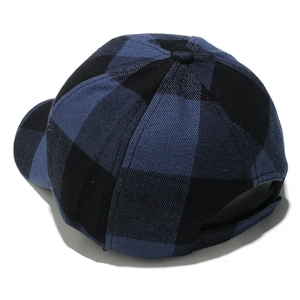 Detail of blue and black buffalo check baseball cap with adjustable rear closure strap