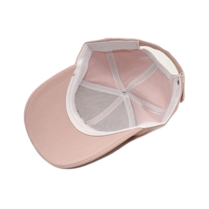 Pink cotton baseball cap interior view with sweatband and adjustable metal buckle