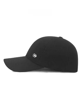 Detail view of the black winter baseball cap with a rectangular metal epoch styles badge