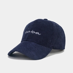 Close-up of Navy Blue Corduroy Baseball Cap featuring white embroidered baba text detail