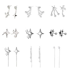 Detailed collection of silver star-shaped earrings including studs and tassel ear lines