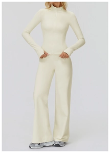 Detail of slim fit yoga set featuring thumb holes jacket and high waist flared leggings