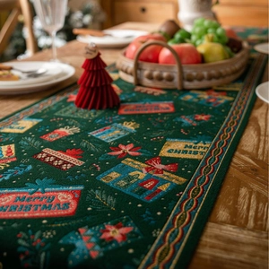 Close-up of green jacquard Christmas table runner with tassels and woven gift patterns