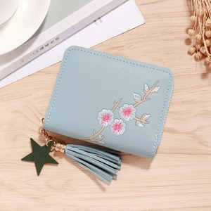 Short zipper wallet for women with flower embroidery and light blue tassel pendant