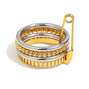 Dual-tone 18K gold and silver layered ring with unique pin charm and beaded texture
