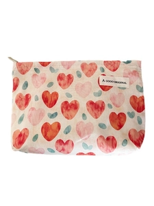Portable fabric heart print makeup bag with zipper and A GOGO ORIGINAL tag on white backdrop