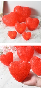 Red heart-shaped LED lights with textured finish in various sizes for stage performances
