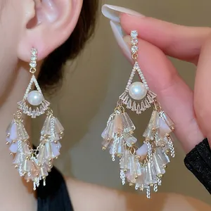 Elegant silver tassel earrings with pearls and pink crystal charms in vintage style