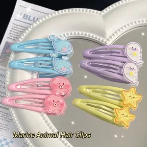 Cute ocean animal BB hair clips set with glittery whale, seal, jellyfish, and starfish shapes