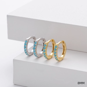 Macro view of 8mm S925 sterling silver hoop earrings with inlaid turquoise stones