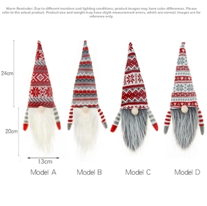 Detail view of four knitted Christmas gnomes with snowflake patterns and size markings