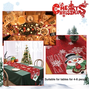 Detail of red Christmas table runner with embroidered snowman for 4-6 person dining tables