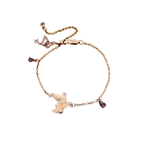 Elegant rose gold butterfly bracelet with matte finish and dark zircon stones on white backdrop