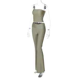 Detail of olive green two-piece set featuring strapless tube top and flare leg trousers