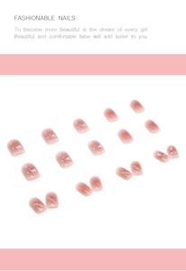 Detail of pink-purple gradient press-on nails with fine glitter and marble design