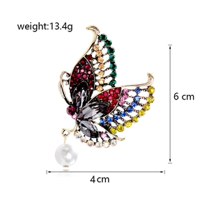 Vintage butterfly brooch with multicolored rhinestones and pearl pendant, 4cm x 6cm