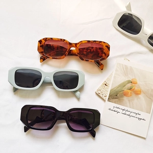 Chic Morandi square sunglasses in tortoiseshell and solid colors on a white textured background