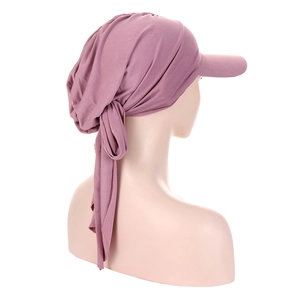 Detail of mauve headscarf featuring pleated design and decorative back bow knot