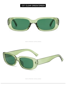 Front and side views of clear green cat eye sunglasses with dark green lenses