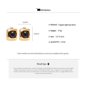 Detailed spec sheet showing gold tiger eye earrings dimensions and premium copper material
