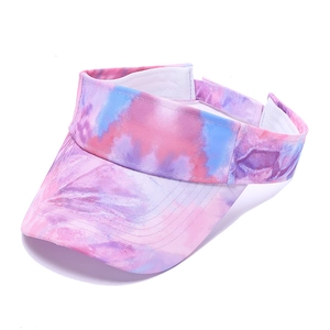 Detail of colorful tie-dye sun visor with pink, purple and blue gradient patterns