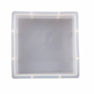 Top-down view of a translucent white square silicone mold for resin casting projects