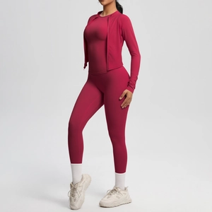 Three-piece berry yoga set with zipper jacket, racerback tank, and high-waist leggings