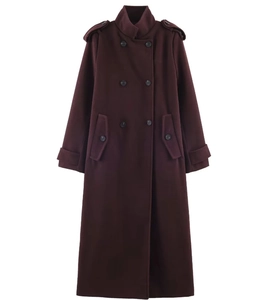 Macro detail of wine red long wool coat with double-breasted buttons and epaulettes