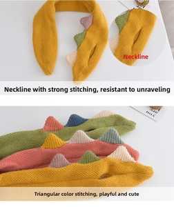 Detail view of the secure slit fastening and dinosaur spikes on a yellow knit scarf