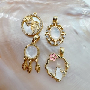 18K gold plated shell pendants including cat, goldfish and dreamcatcher designs