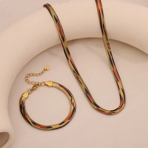 Set collana e bracciale a catena serpente in acciaio dorato con motivo leopardato su base
