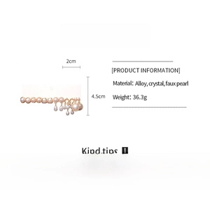 Detailed view of alloy drop earrings featuring faux pearls and crystal embellishments