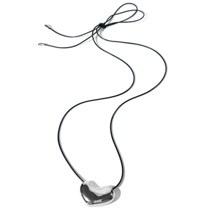 Detailed view of polished 3D heart pendant with sleek black cord necklace